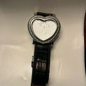 Silver and black JoJo watch. Heart shape with Little diamonds.